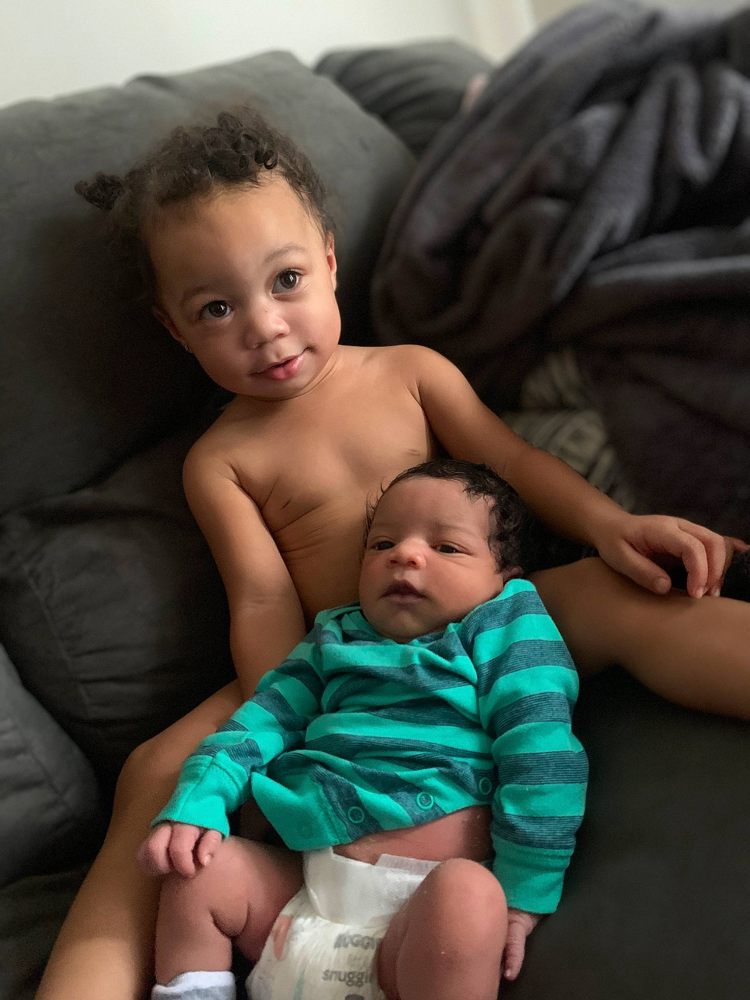 Freddie is registered to the contest to win money with this photo: arm, baby, chest, child, comfort, couch, finger, flash_photography, hairstyle, happy, human, iris, joint, muscle, organ, person, shoulder, skin, stomach, thigh