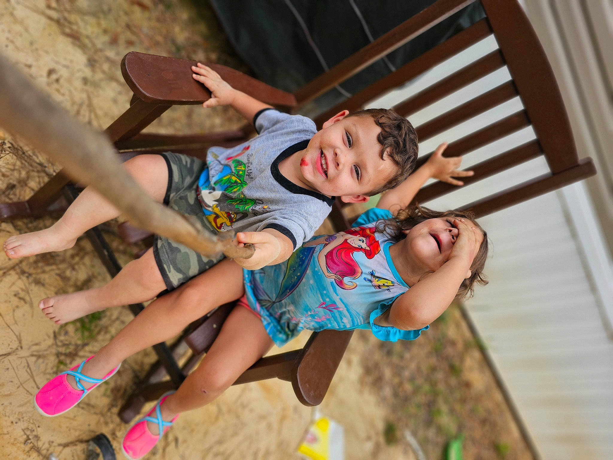 Jonathon is registered to the contest to win money with this photo: barefoot, child, finger, foot, fun, grass, happy, human_leg, joy, leisure, people_in_nature, person, recreation, shorts, sitting, sock, summer, thigh, toddler, tree