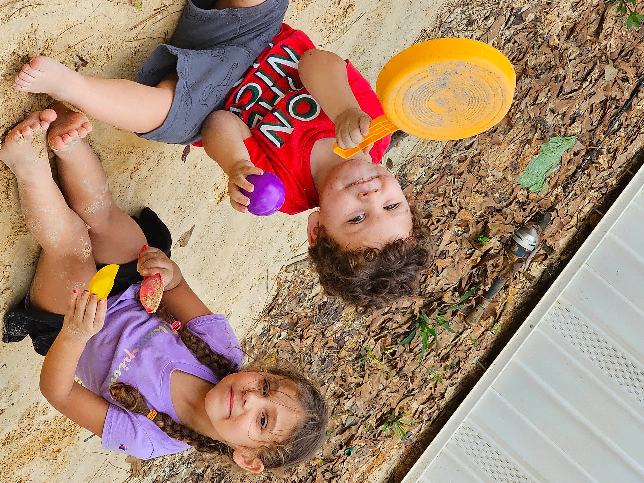 Jonathon is registered to the contest to win money with this photo: beach, child, fun, grass, happy, hat, joy, leisure, people, people_in_nature, people_on_beach, person, photograph, play, recreation, sand, shorts, smile, soil, sun_hat