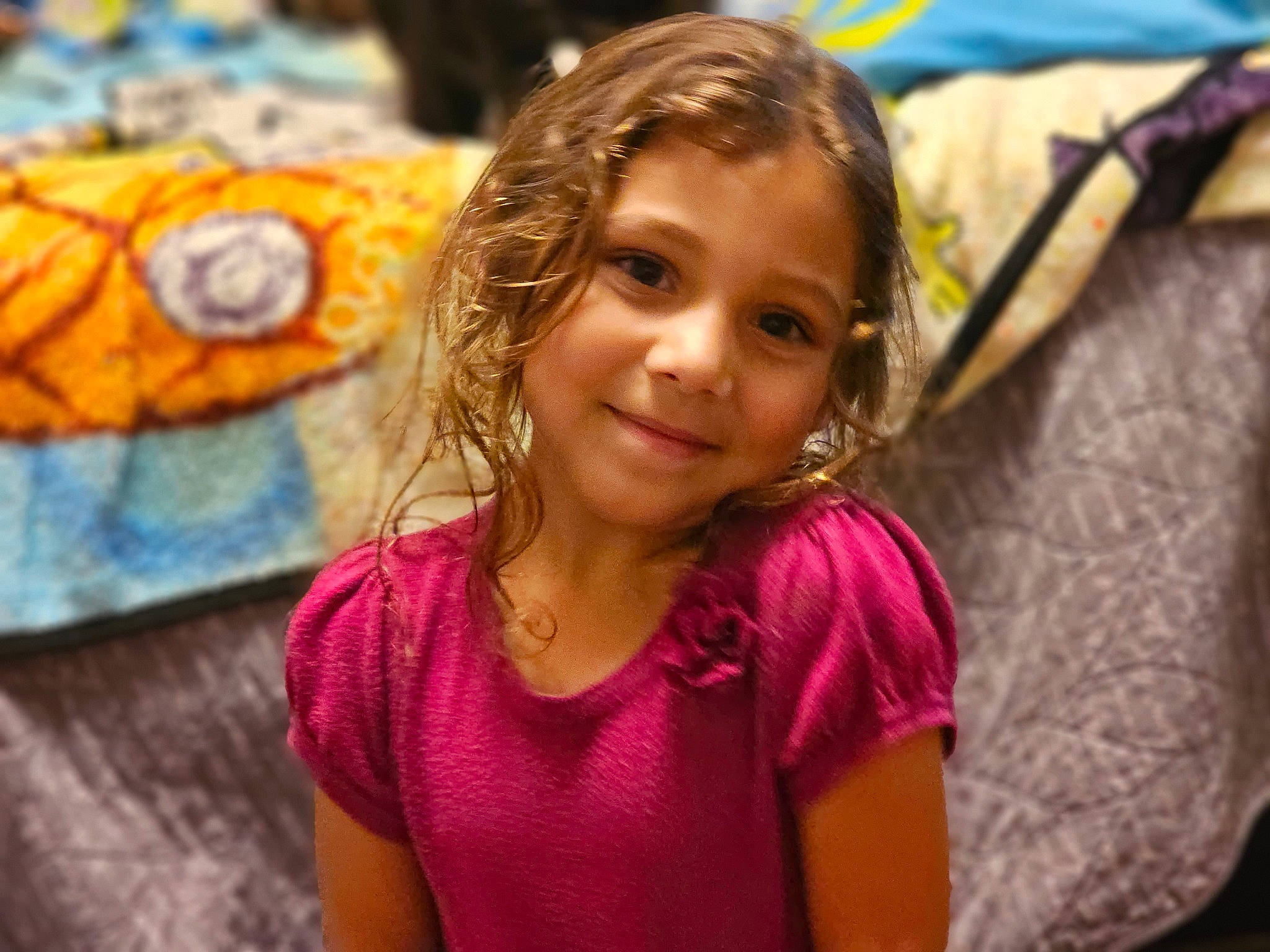 Serenity is registered to the contest to win money with this photo: child, event, fashion_accessory, fun, happy, iris, joy, laugh, leisure, person, portrait_photography, recreation, sitting, skin, smile, street, t_shirt, toddler, tourism, tradition