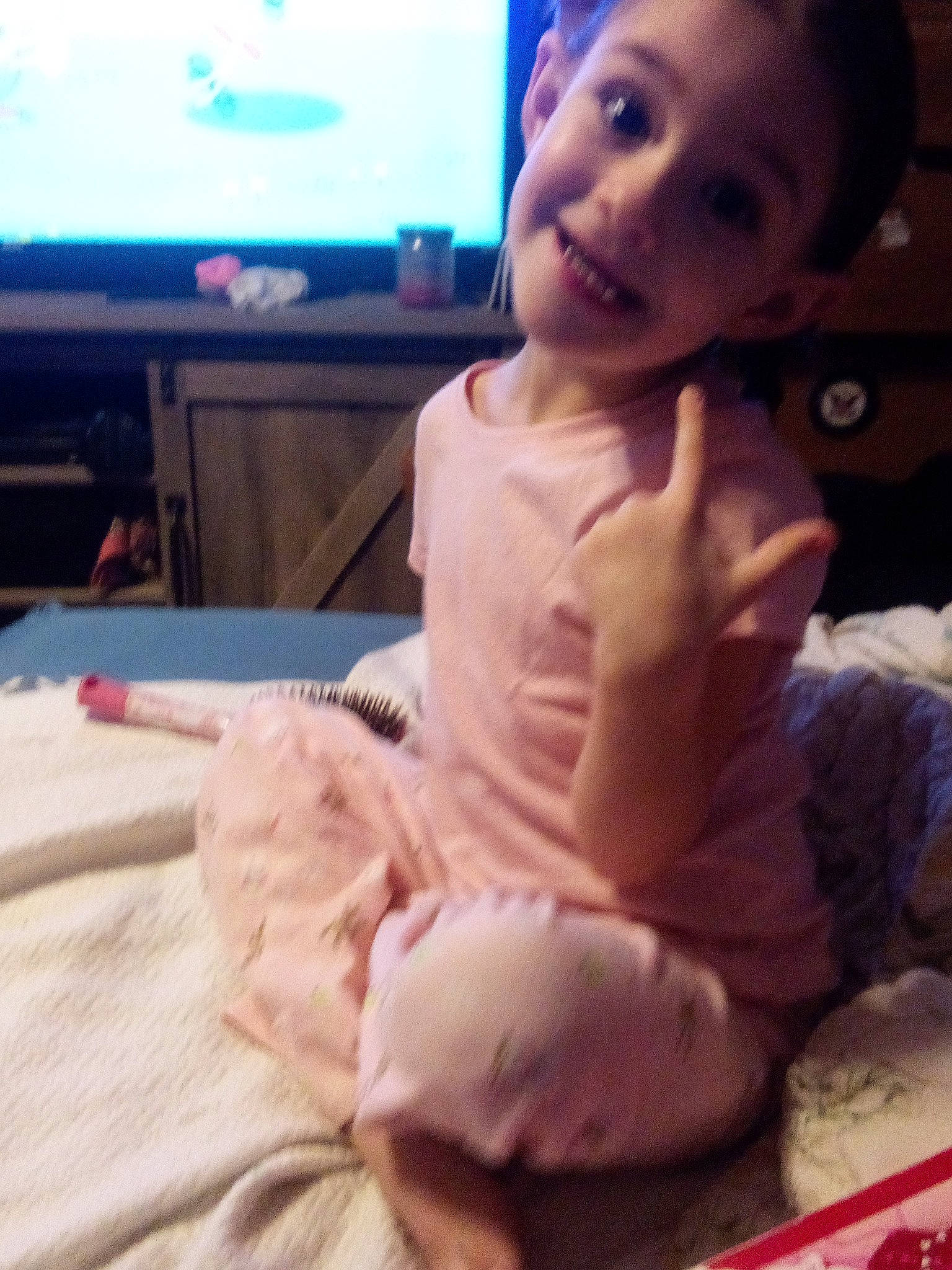 Renesmee is registered to the contest to win money with this photo: baby_toddler_clothing, comfort, dress, eye, finger, hand, happy, head, human_body, iris, joy, leg, lip, mouth, muscle, person, skin, sleeve, smile, thigh