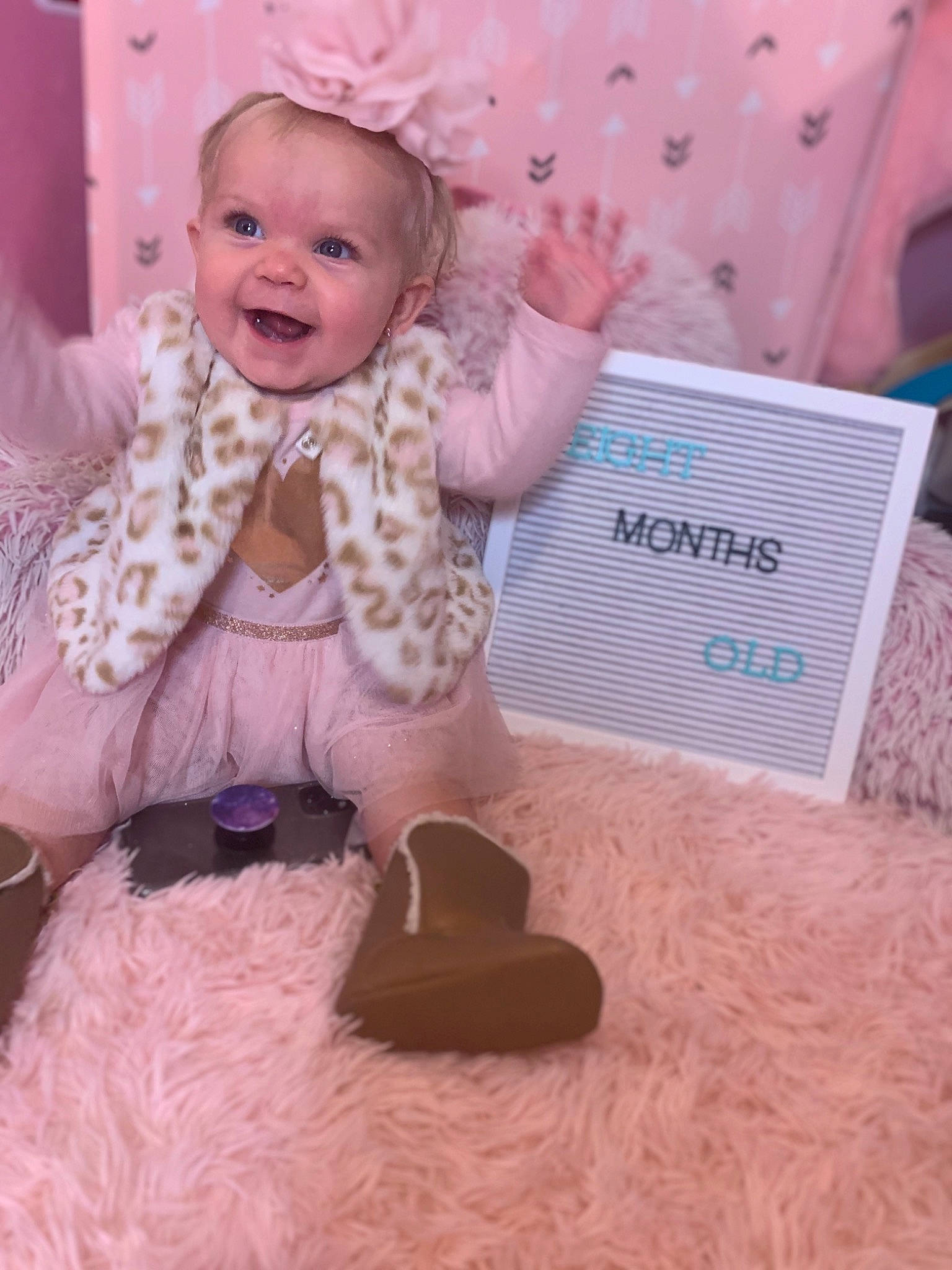 Everleigh Alexa is registered to the contest to win money with this photo: baby, baby_laughing, baby_products, baby_toddler_clothing, child, event, fun, fur, happy, laugh, magenta, pattern, peach, person, pink, play, purple, sitting, sleeve, smile