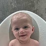 baby, smile, face, water_droplets, bath_seat, child, skin, head, indoors, happy, person, background, seat, young_child, portrait, expression, water, cute, infant, sitting