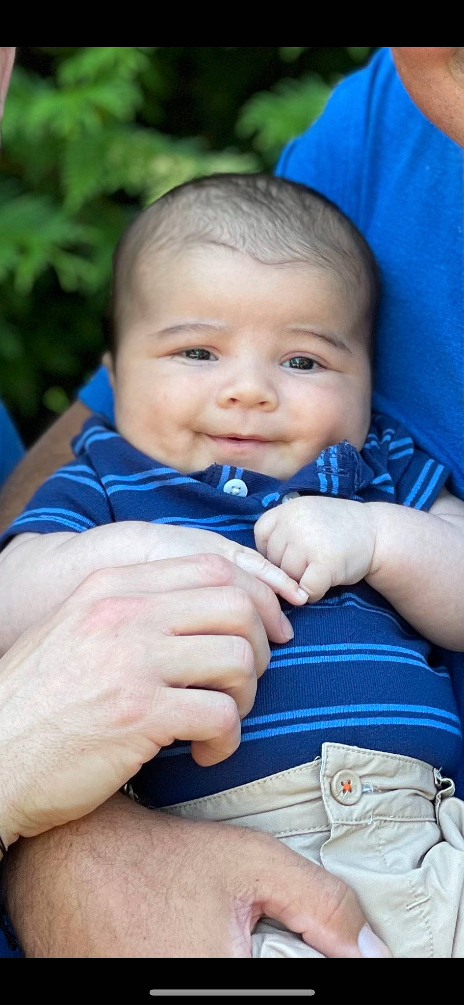 Lucas is registered to the contest to win money with this photo: arm, azure, baby_toddler_clothing, cheek, eye, face, facial_expression, gesture, hand, happy, head, human_body, iris, lip, mouth, nose, organ, person, product, skin