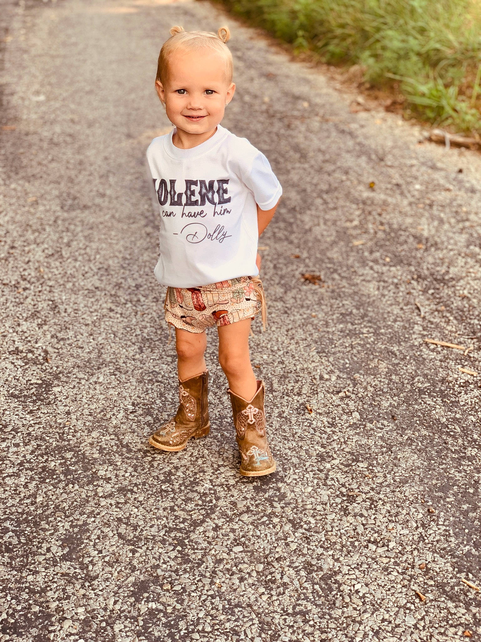 Harlee is registered to the contest to win money with this photo: asphalt, baby, baby_toddler_clothing, child, flooring, grass, happy, human_leg, joy, leg, leisure, people_in_nature, person, recreation, road_surface, shorts, sleeve, smile, street_fashion, t_shirt