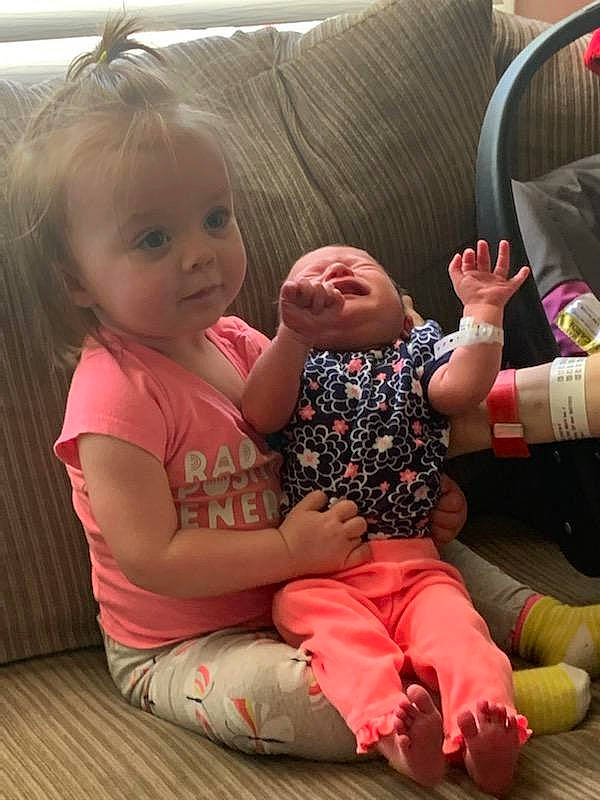 Emerie June joined the competition — help win amazing prizes! arm, baby, cheek, child, finger, leg, person, pink, play, product, sibling, sitting, skin, toddler