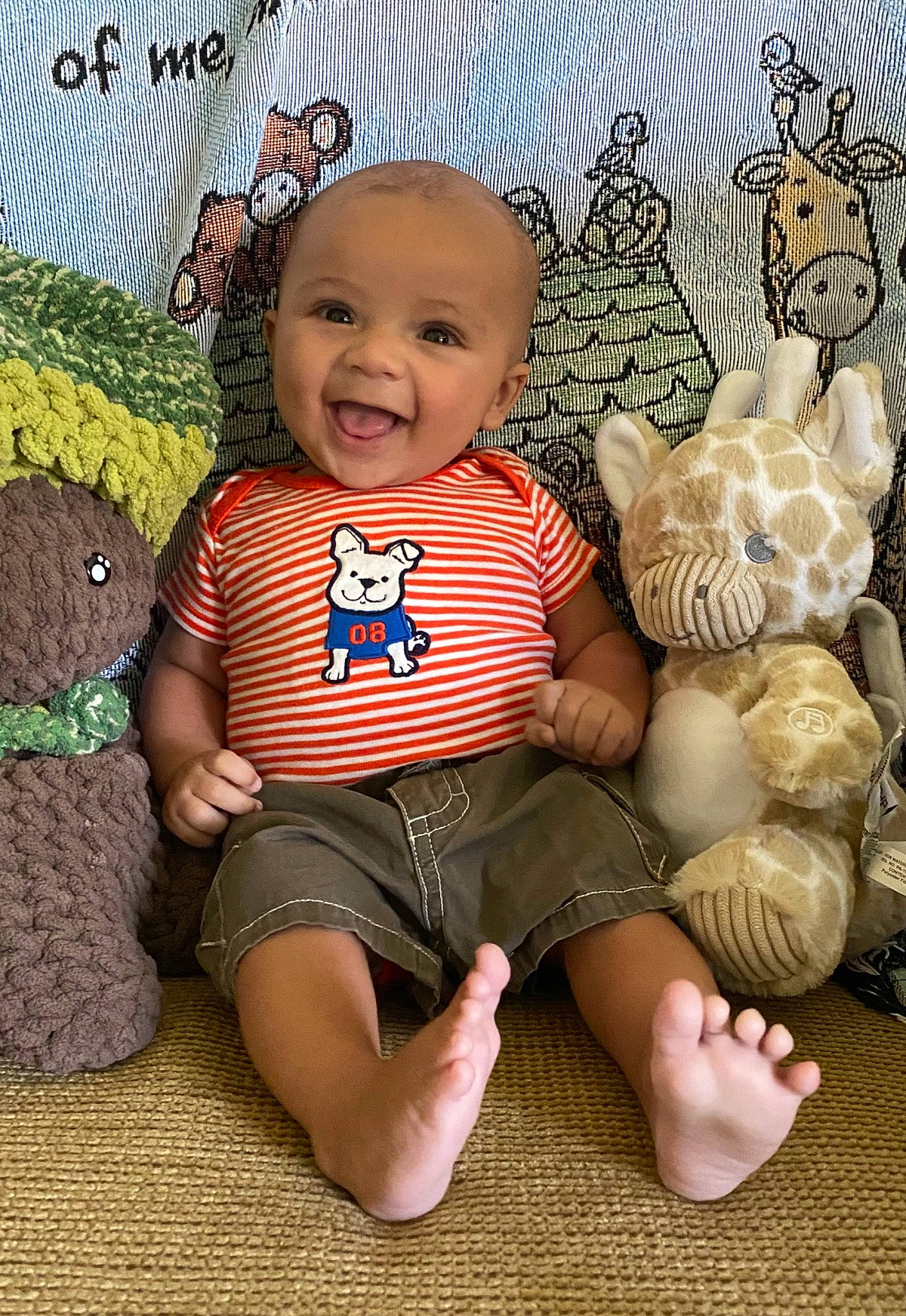 Honor is registered to the contest to win money with this photo: baby, baby_products, baby_toddler_clothing, baby_toys, cheek, child, fashion_accessory, foot, happy, headgear, pattern, person, room, sitting, sleeve, smile, stuffed_toy, textile, toddler, toy