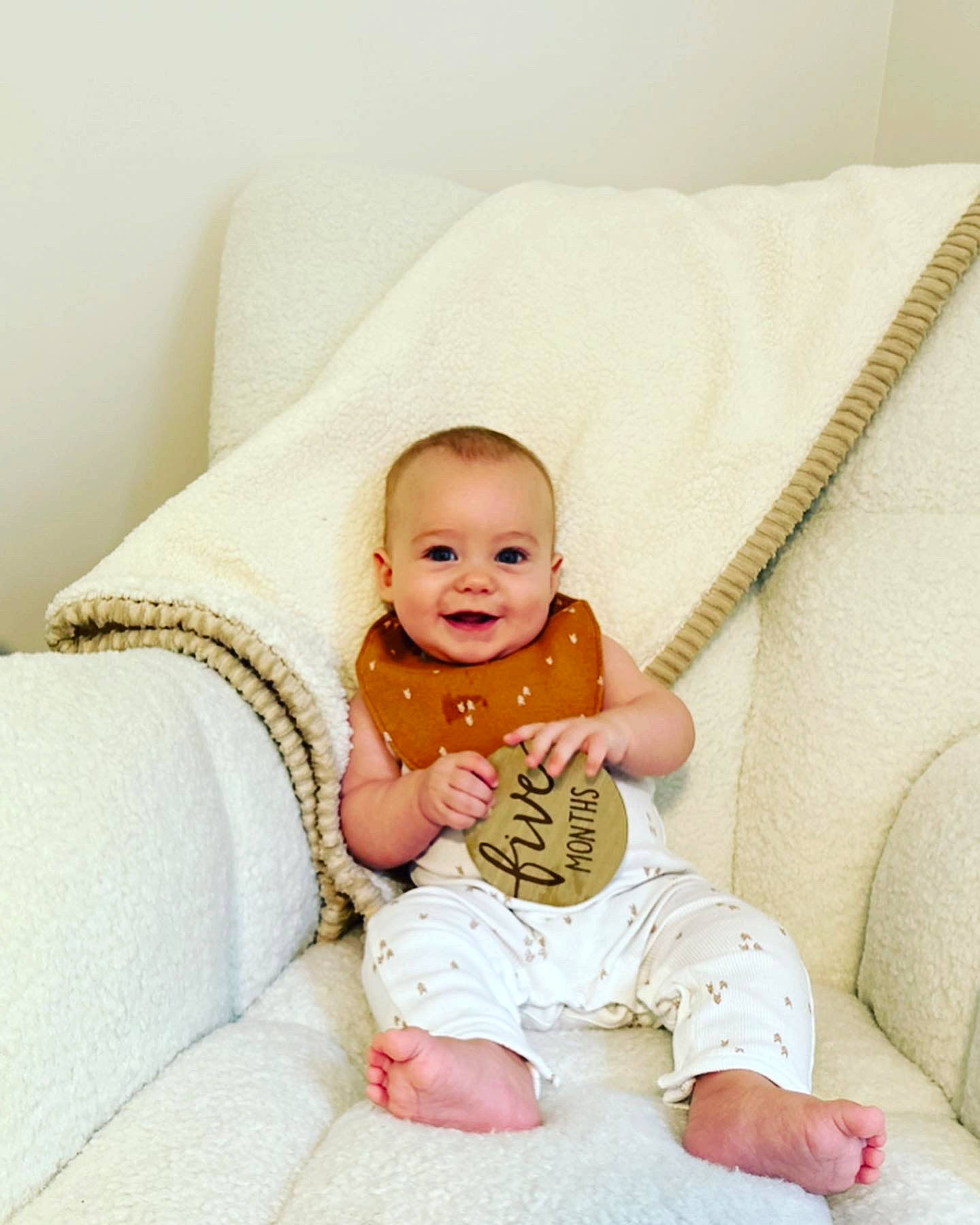 Everett joined the competition — help win amazing prizes! baby, baby_toddler_clothing, child, comfort, couch, foot, happy, human_leg, joy, knee, linens, person, room, sitting, skin, sleeve, smile, t_shirt, thigh, throw_pillow