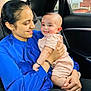 Ram joined the competition — help win amazing prizes! baby, woman, smile, car_interior, blue_blouse, pink_outfit, holding, happy, portrait, child, seat, window, casual_clothing, skin, hand, people, transportation, comfort, family, love