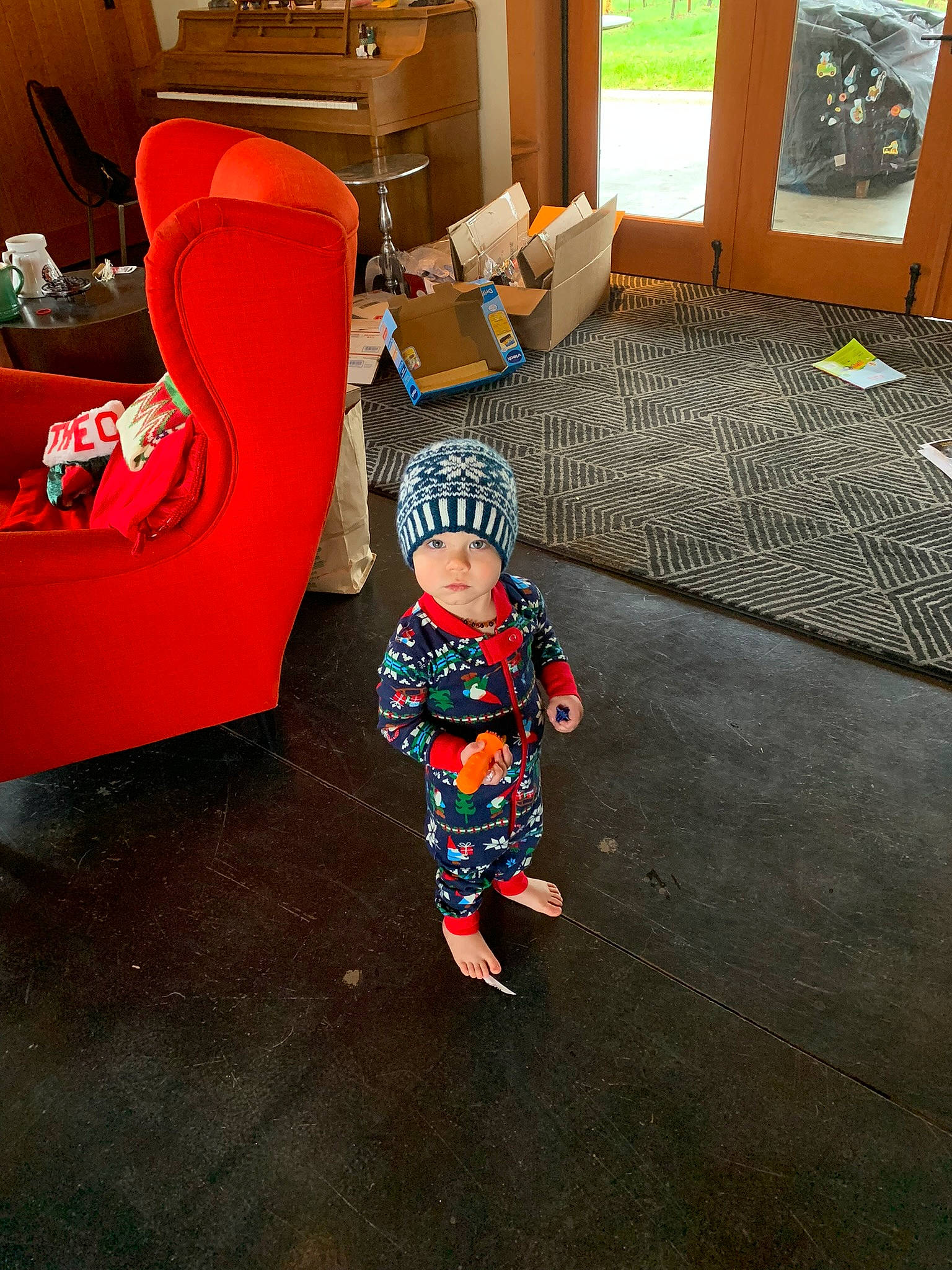 Orion joined the competition — help win amazing prizes! baby, baby_toddler_clothing, carmine, carpet, child, comfort, couch, door, floor, flooring, fun, hardwood, headwear, home, interior_design, living_room, person, room, sitting, t_shirt