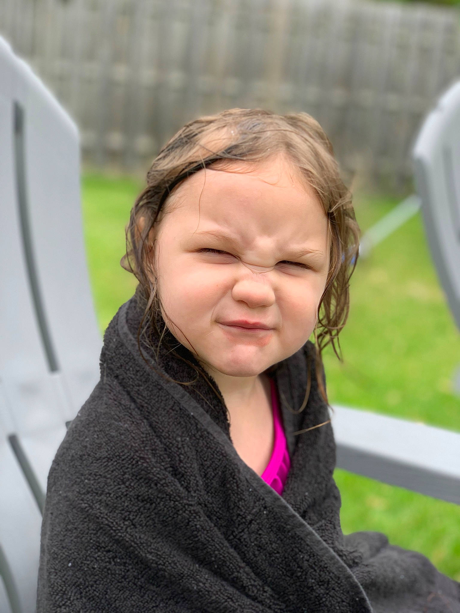 Everlee is registered to the contest to win money with this photo: blond, cheek, child, event, fun, fur, grass, happy, hoodie, leisure, lip, neck, person, portrait_photography, recreation, sitting, smile, vacation