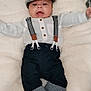 Loan participe au concours pour gagner de l'argent avec cette photo : accessories, baby, bodypart, bonnet, cap, clothing, couch, face, finger, furniture, hand, hat, head, jeans, pants, person, photography, portrait, shorts, suspenders