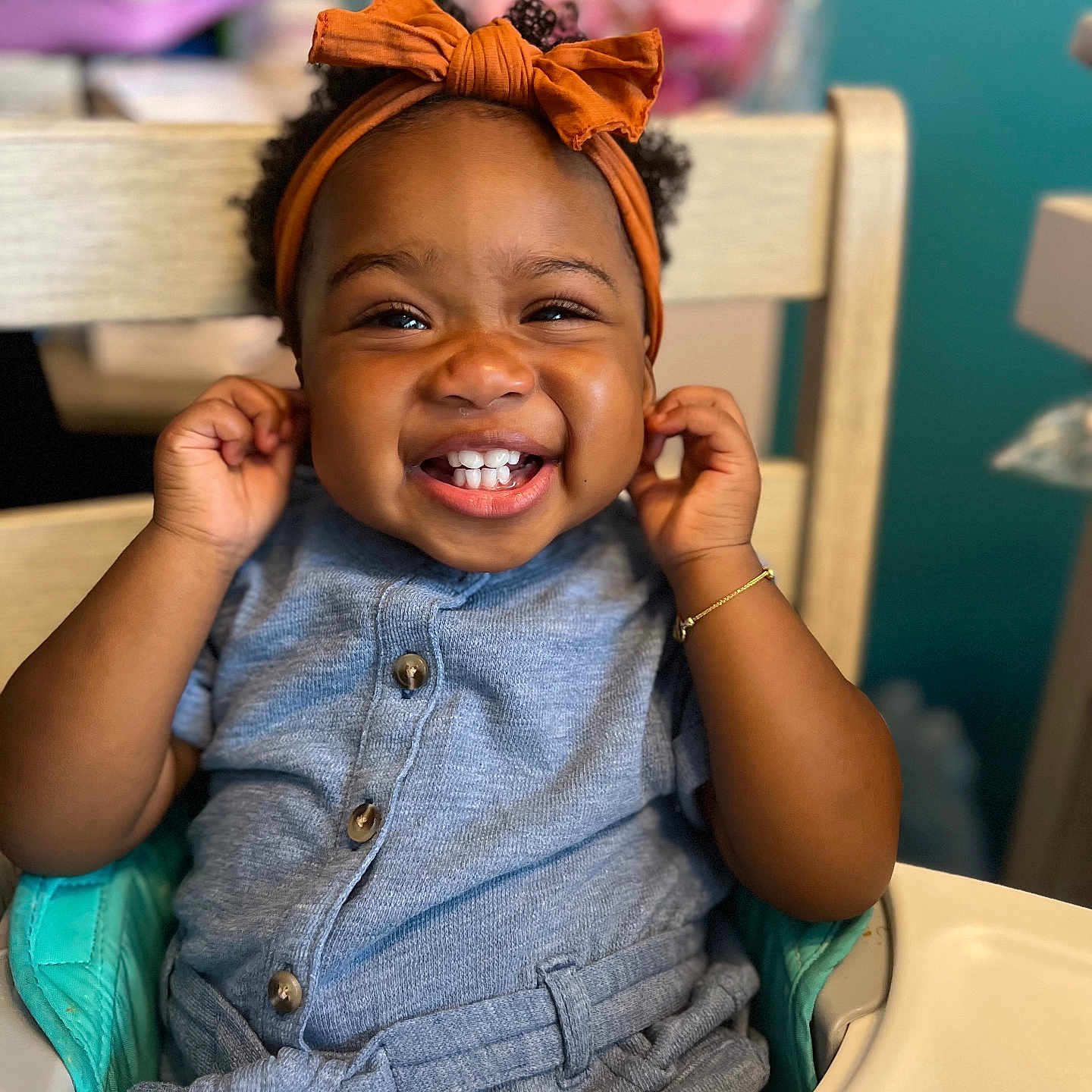 Makena joined the competition — help win amazing prizes! accessories, baby, babylaughing, bodypart, bracelet, dimples, face, happy, head, indoors, jewelry, laughing, mouth, necklace, person, photography, portrait, sitting, smile, teeth