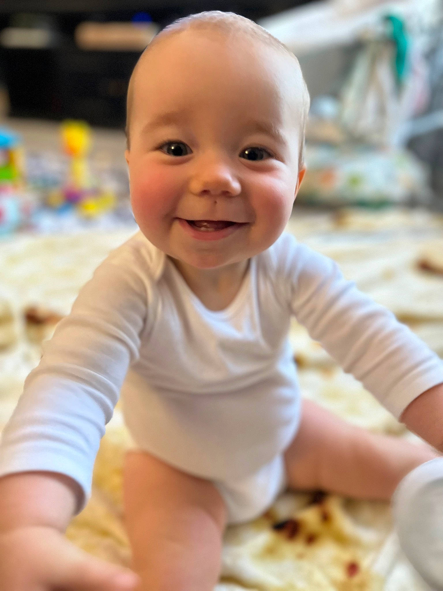 Lilly joined the competition — help win amazing prizes! baby, baby_toddler_clothing, cheek, child, comfort_food, crawling, flooring, foot, fun, happy, joy, nose, person, play, portrait_photography, sitting, skin, sleeve, smile, thumb