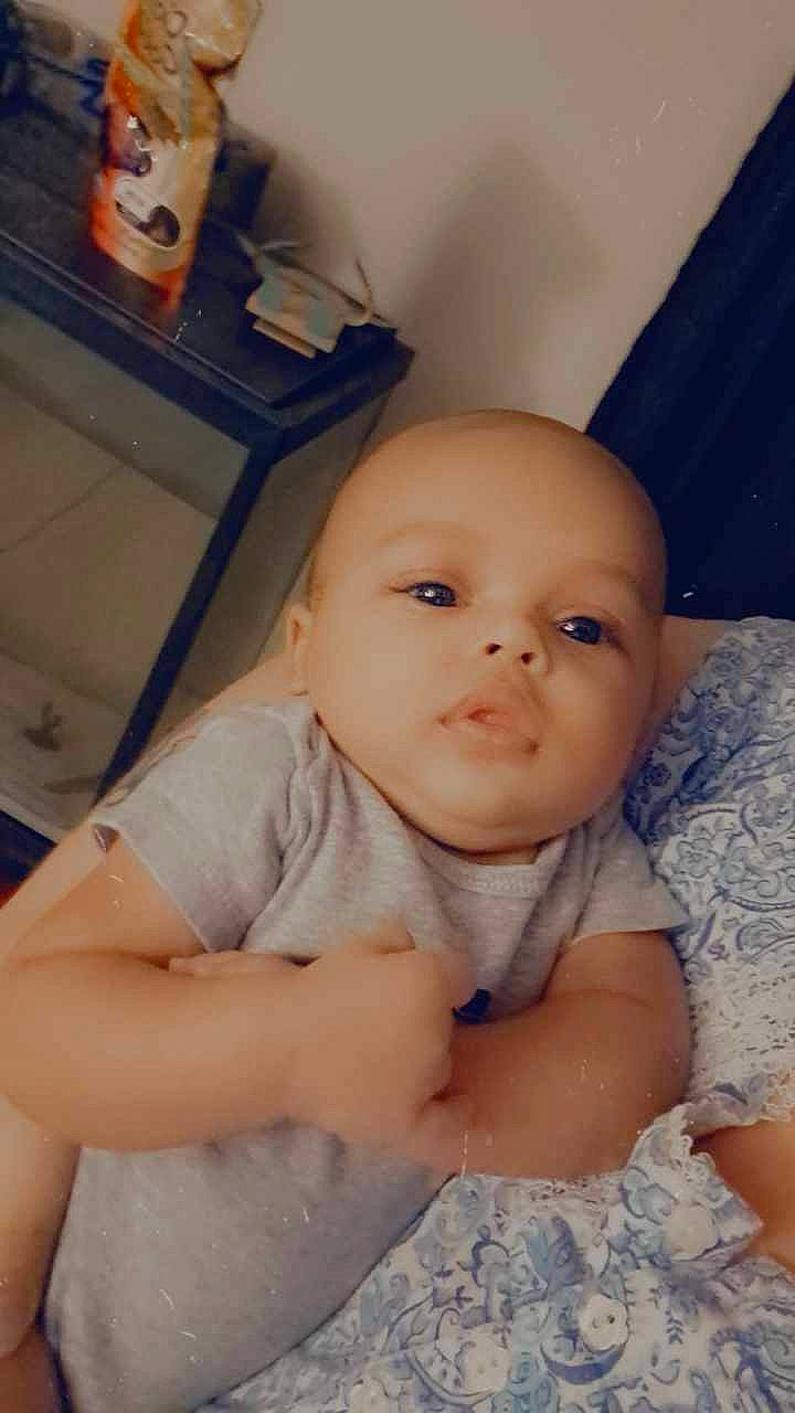 Nikolai joined the competition — help win amazing prizes! baby, baby_products, baby_safety, baby_toddler_clothing, bedding, cheek, child, comfort, eye, fun, happy, iris, linens, mouth, nose, person, room, sitting, smile, toddler