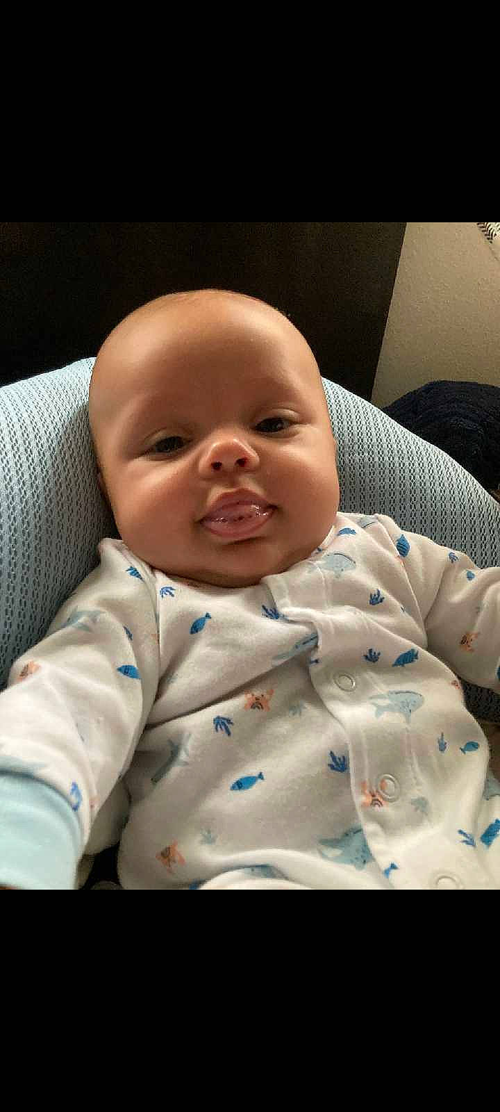 Nikolai is registered to the contest to win money with this photo: baby, baby_toddler_clothing, bedtime, cheek, child, comfort, eye, iris, linens, mouth, nose, person, room, skin, sleeve, smile, toddler