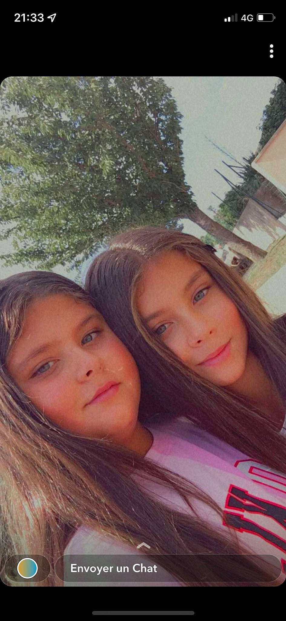 Lara participe au concours pour gagner de l'argent avec cette photo : black_hair, cheek, chin, cool, eye, eyebrow, eyelash, forehead, fun, grass, hair, happy, iris, leisure, lip, nose, person, plant, skin, smile