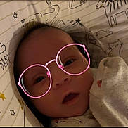 Graylee joined the competition — help win amazing prizes! baby, face, glasses_filter, digital_effect, blanket, animal_drawings, cute, infant, lying_down, portrait, child, indoors, cozy, soft_lighting, expression, clothing, head, skin, eyes, mouth