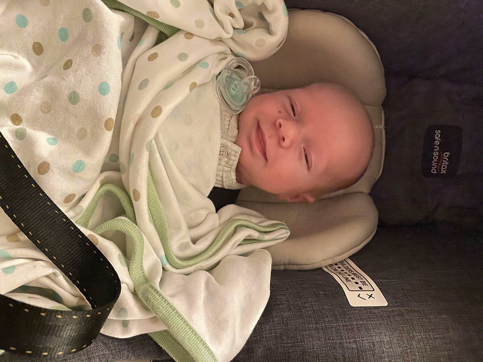 Zieke is registered to the contest to win money with this photo: baby, baby_carriage, baby_products, baby_sleeping, baby_toddler_clothing, bedtime, cheek, child, comfort, eye, face, fashion_accessory, head, linens, nap, pattern, person, sitting, sleeve, toddler