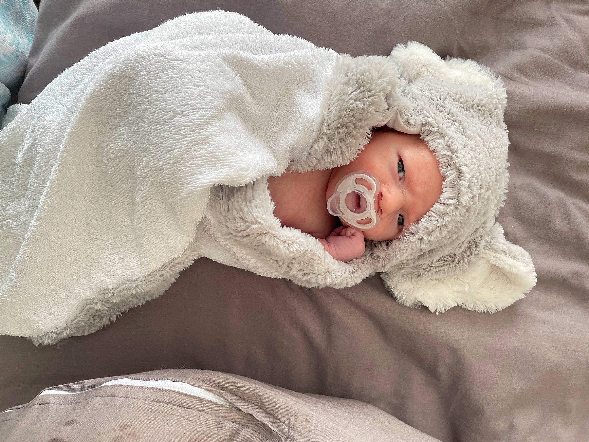 Zieke joined the competition — help win amazing prizes! baby, baby_products, baby_sleeping, baby_toddler_clothing, child, comfort, embellishment, eye, fashion_accessory, fur, hair_accessory, hand, head, headgear, headwear, linens, lip, person, sleeve, textile