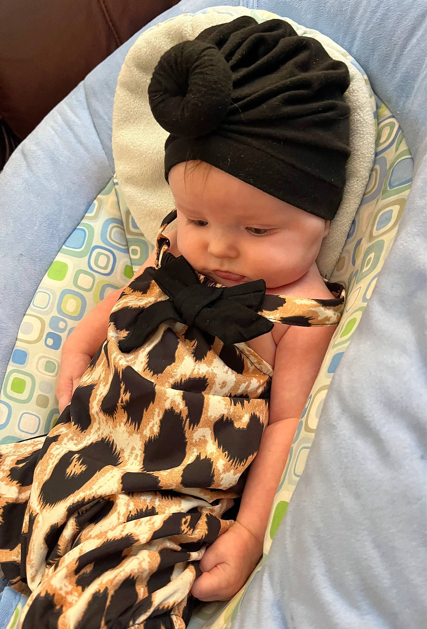 Guinevere joined the competition — help win amazing prizes! baby, baby_toddler_clothing, cap, child, comfort, face, fashion_accessory, fashion_design, head, headgear, headwear, knit_cap, linens, neck, outerwear, pattern, person, skin, sleeve, textile