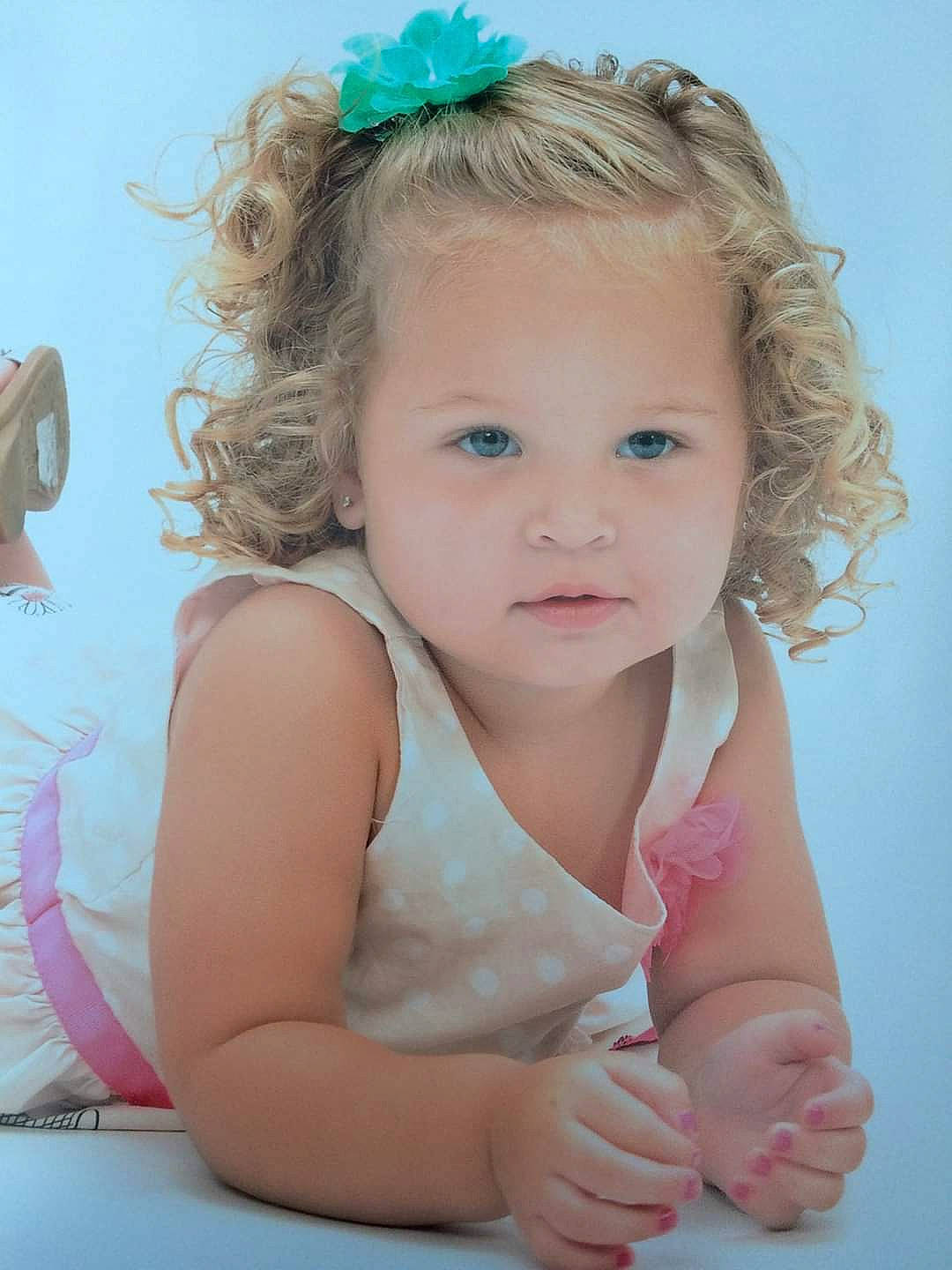 Melayna joined the competition — help win amazing prizes! baby, child, child_model, face, hair_accessory, person, pink, skin, smile, toddler