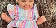 Mila Raine joined the competition — help win amazing prizes! baby, bows, child, cute, feet, grass, ground, hair, happy, infant, legs, nature, outdoor, portrait, sitting, skin, smiling, striped_clothing, sunlight, tree