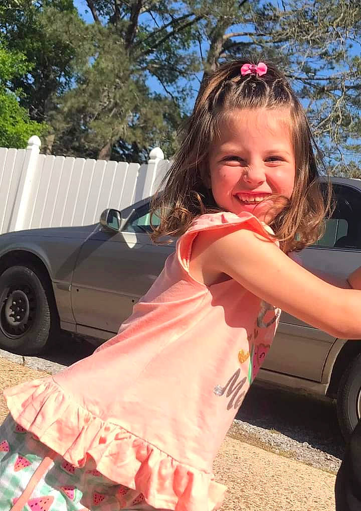 Kinlee joined the competition — help win amazing prizes! automotive_design, automotive_exterior, automotive_lighting, automotive_tire, bumper, car, cool, grass, happy, hood, joy, leisure, motor_vehicle, person, pink, sky, smile, tire, tree, vehicle