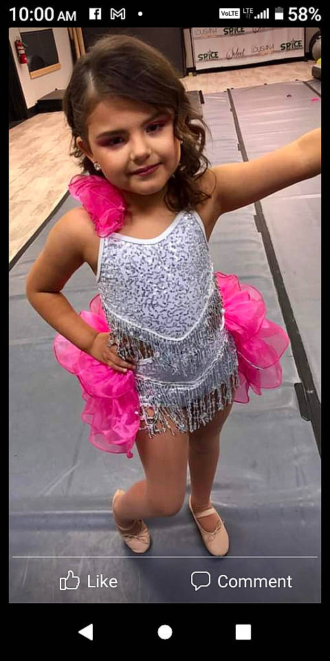 Kaizlee is registered to the contest to win money with this photo: baby_toddler_clothing, beauty, day_dress, embellishment, event, eyelash, fashion_accessory, fashion_design, happy, human_leg, joy, leg, magenta, person, pink, purple, sleeve, smile, snapshot, thigh