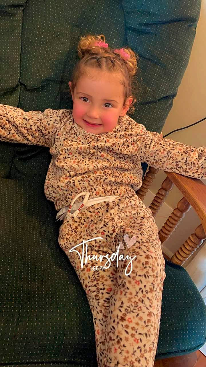 Luna joined the competition — help win amazing prizes! baby, bodypart, chair, clothing, couch, cushion, dress, face, furniture, happy, head, homedecor, indoors, mouth, pajamas, pants, person, photography, portrait, teeth