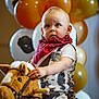 child, toddler, toy_horse, plush_toy, balloons, cowboy_outfit, bandana, indoor, party, celebration, cute, portrait, young_child, costume, festive, playful, person, face, blue_eyes, light