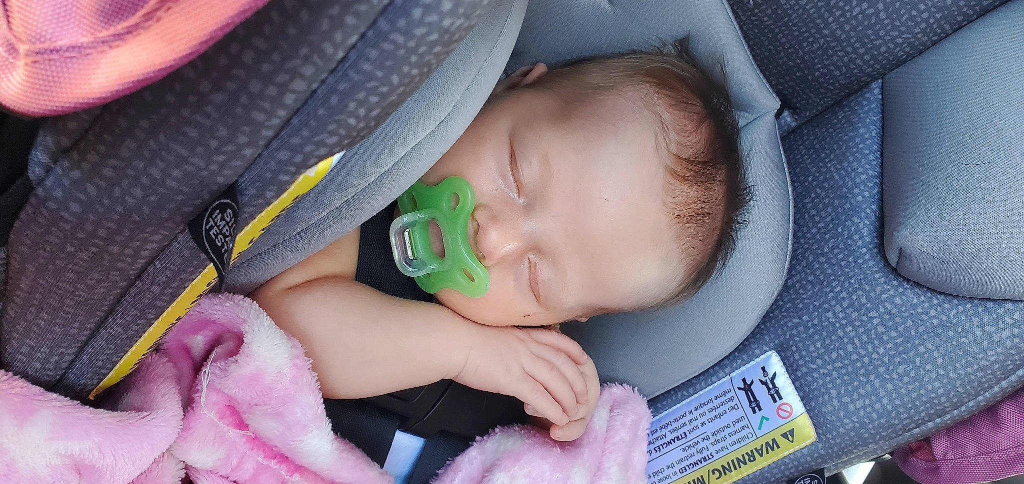 Arabella joined the competition — help win amazing prizes! baby, baby_carriage, baby_products, baby_toddler_clothing, blue, cheek, child, close_up, comfort, facial_expression, finger, happy, iris, mouth, nail, person, pink, sitting, skin, thumb