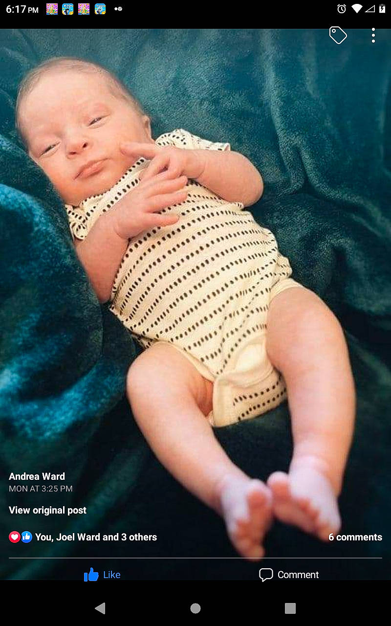 Levi is registered to the contest to win money with this photo: abdomen, advertising, baby, bracelet, chest, flash_photography, gesture, happy, human_leg, jewellery, muscle, nail, pattern, person, photo_caption, photograph, screenshot, thigh, thumb, toddler