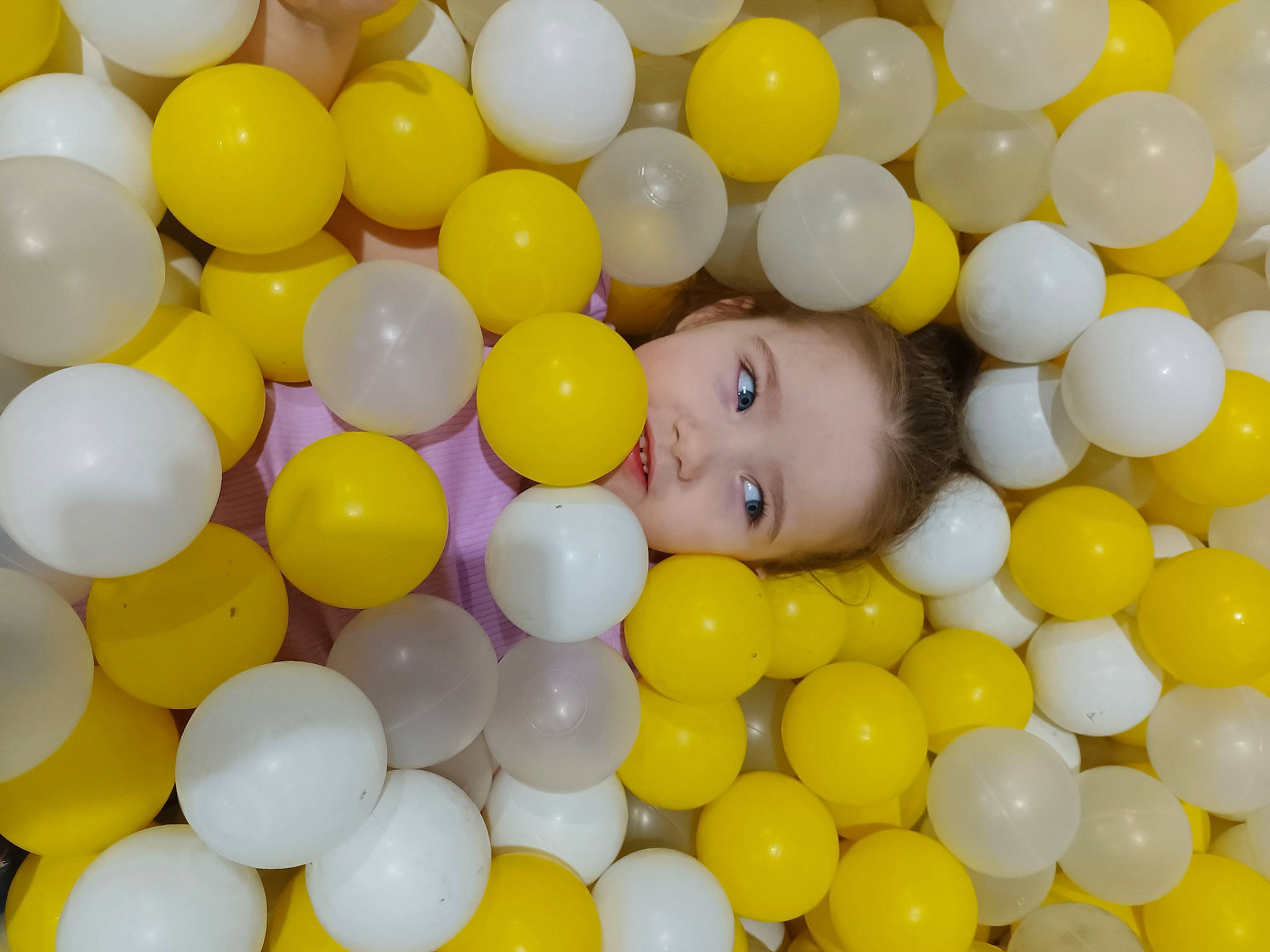Carolyn joined the competition — help win amazing prizes! baby, baby_products, baby_toys, ball_pit, child, circle, event, eye, facial_expression, fun, happy, leisure, mammal, party_supply, pattern, people, person, play, playground, product