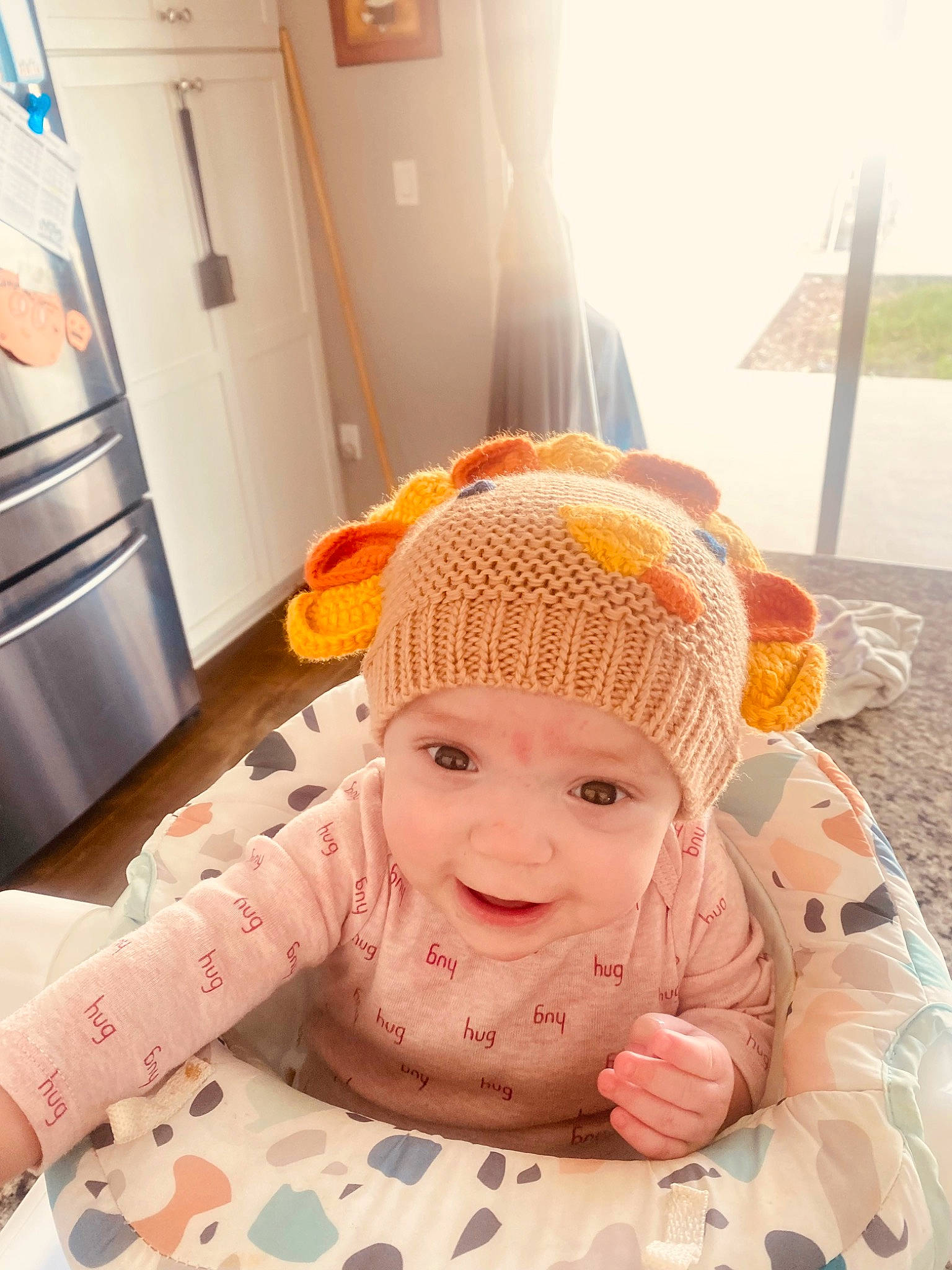 Xiamara joined the competition — help win amazing prizes! baby, baby_toddler_clothing, cabinetry, cap, child, comfort, door, flooring, happy, head, headgear, headwear, orange, person, skin, sleeve, smile, textile, toddler, white