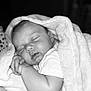 baby, sleeping, blanket, infant, cozy, soft, peaceful, wrapped, hand, face, monochrome, black_and_white, cute, newborn, portrait, child, relaxing, toddler, calm, resting