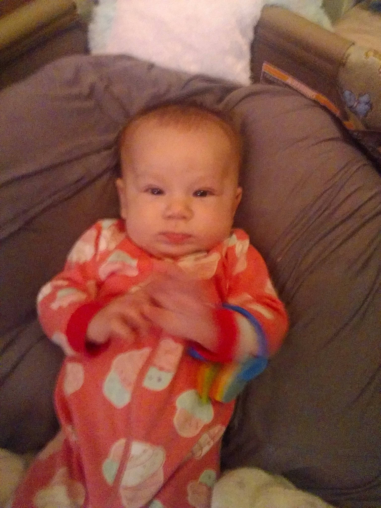 Braxlee joined the competition — help win amazing prizes! baby, baby_toddler_clothing, cheek, child, comfort, couch, eye, face, fun, happy, iris, linens, mouth, nose, person, room, sitting, skin, sleeve, thumb