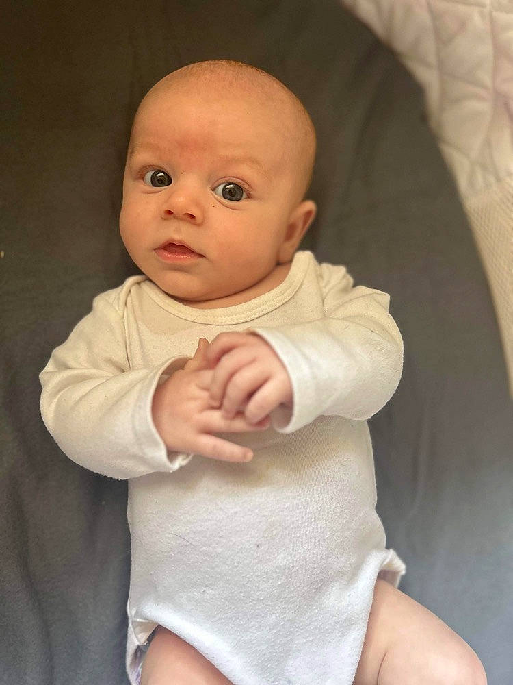 Colson joined the competition — help win amazing prizes! baby, baby_toddler_clothing, cheek, chest, child, collar, comfort, elbow, gesture, head, human_leg, linens, lip, nose, person, sitting, skin, sleeve, stomach, thumb