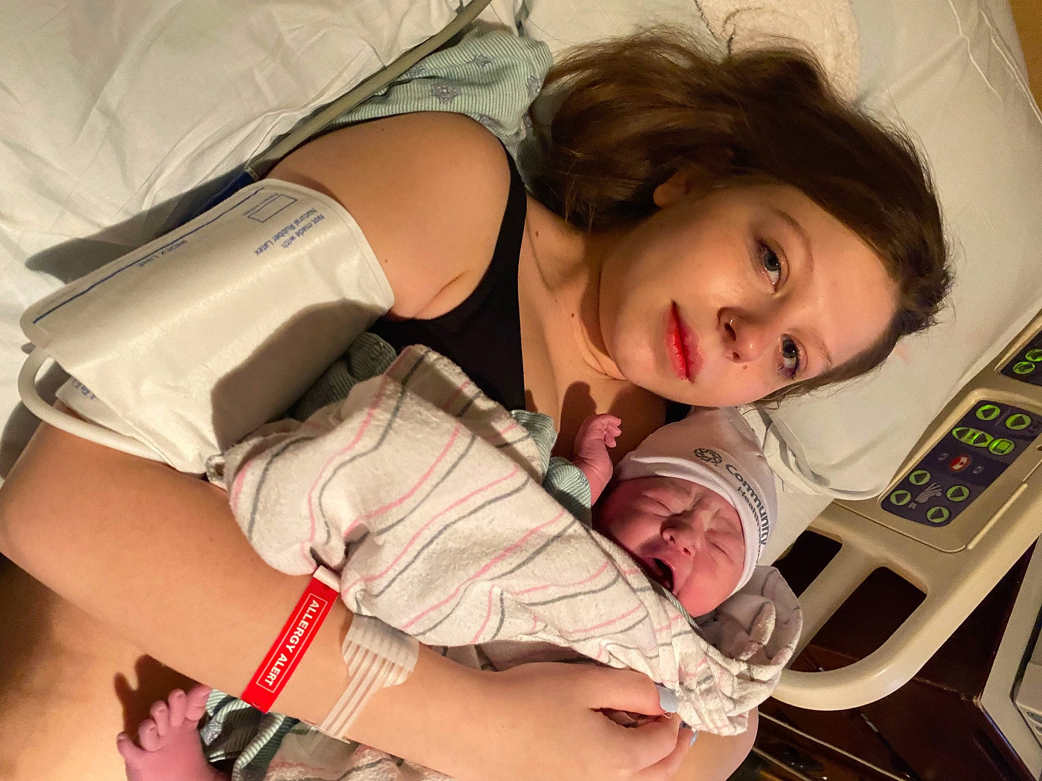 Colson joined the competition — help win amazing prizes! abdomen, baby, black_hair, brown_hair, chest, comfort, elbow, eyelash, facial_expression, gesture, happy, headwear, human_leg, knee, long_hair, mouth, person, skin, smile, thigh