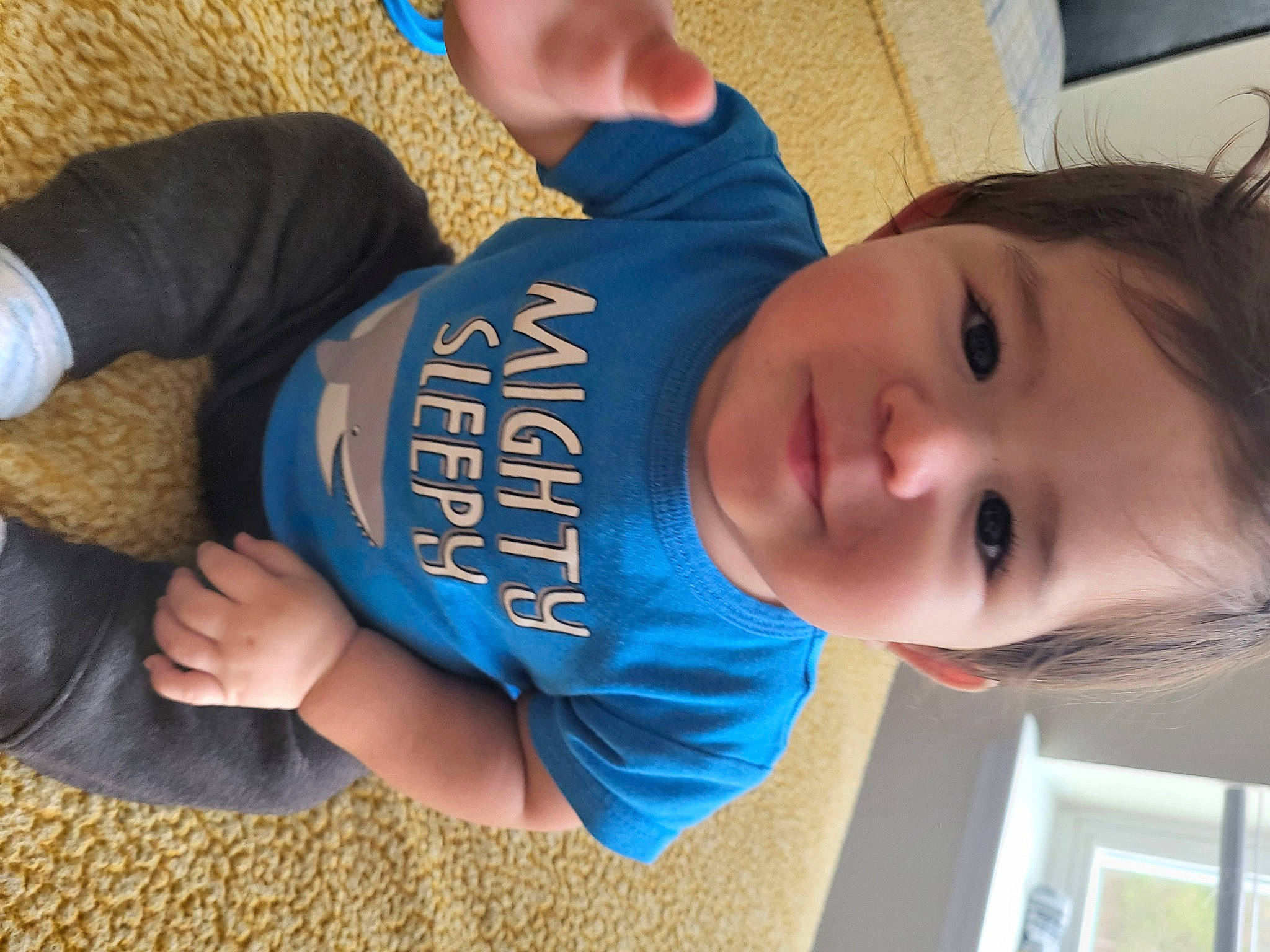 Mateo is registered to the contest to win money with this photo: baby, baby_toddler_clothing, cheek, child, chin, clothing, elbow, electric_blue, fun, hairstyle, joy, knee, mouth, nose, person, skin, sleeve, t_shirt, thumb, toddler