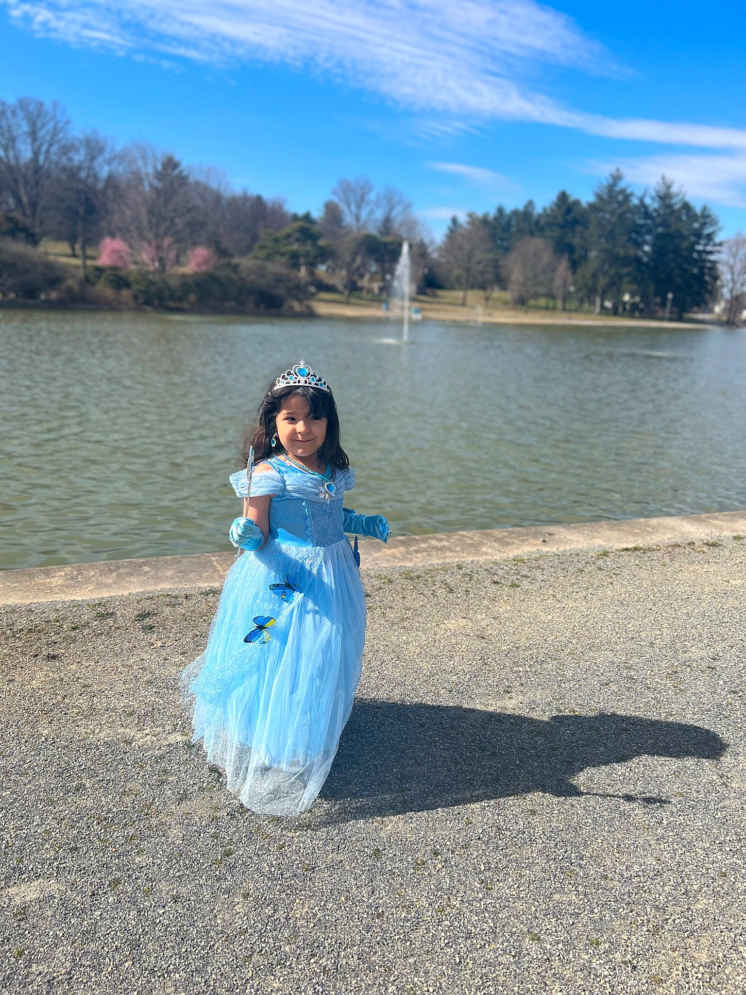 Alaia is registered to the contest to win money with this photo: bank, cloud, dress, electric_blue, fun, grass, happy, joy, lake, landscape, leisure, nature, people_in_nature, person, plant, recreation, sky, summer, travel, tree