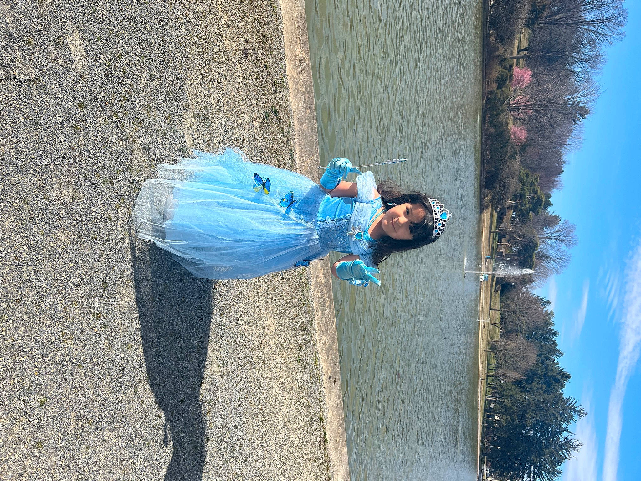 Alaia is registered to the contest to win money with this photo: asphalt, azure, concrete, denim, electric_blue, freezing, fun, landscape, leisure, people_in_nature, person, recreation, road_surface, shadow, sky, smile, tints_and_shades, travel, tree, water