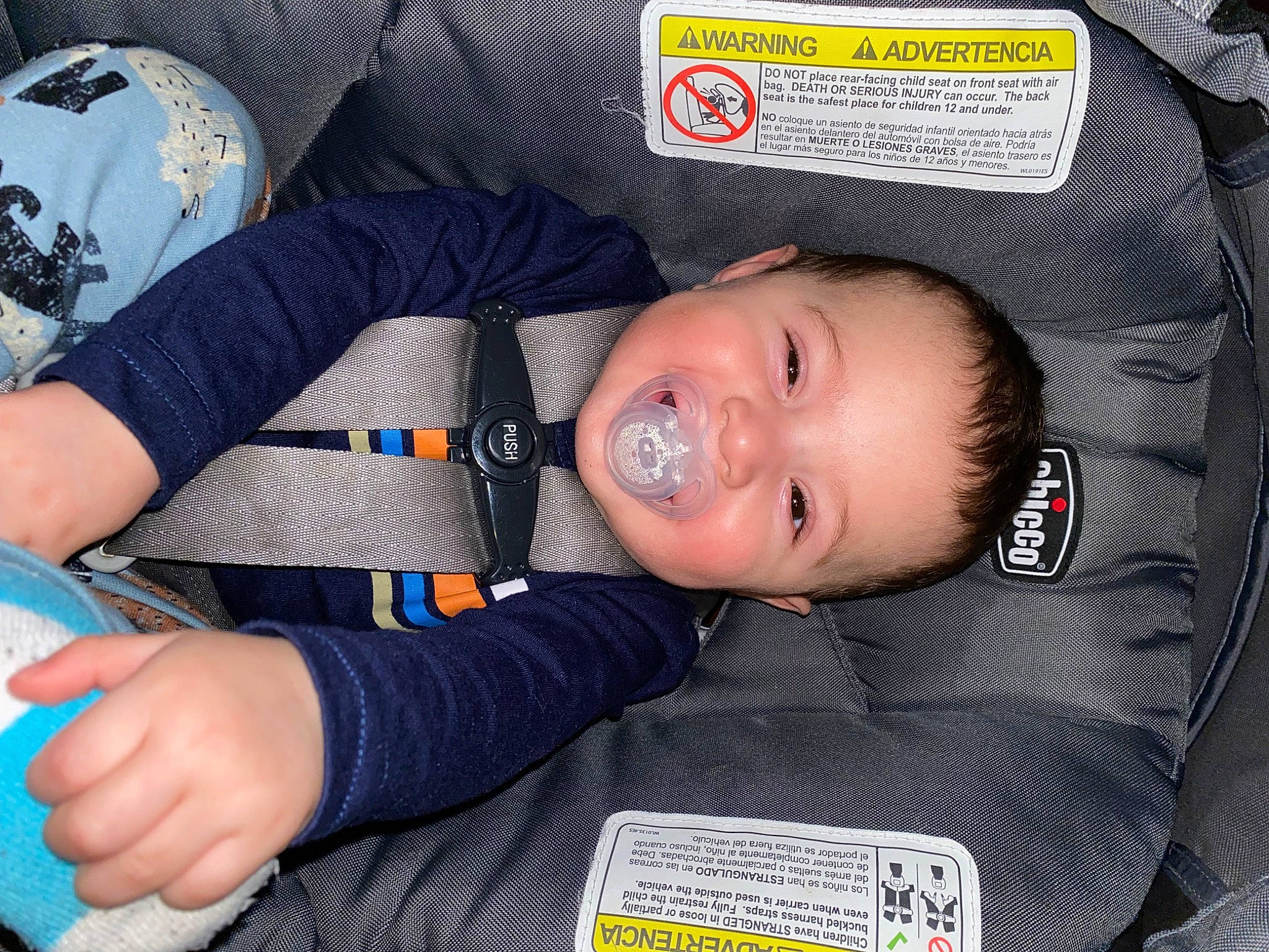 Brian is registered to the contest to win money with this photo: baby, baby_products, baby_toddler_clothing, child, comfort, elbow, electric_blue, fun, joy, mouth, person, sleeve, smile, toddler, wrist