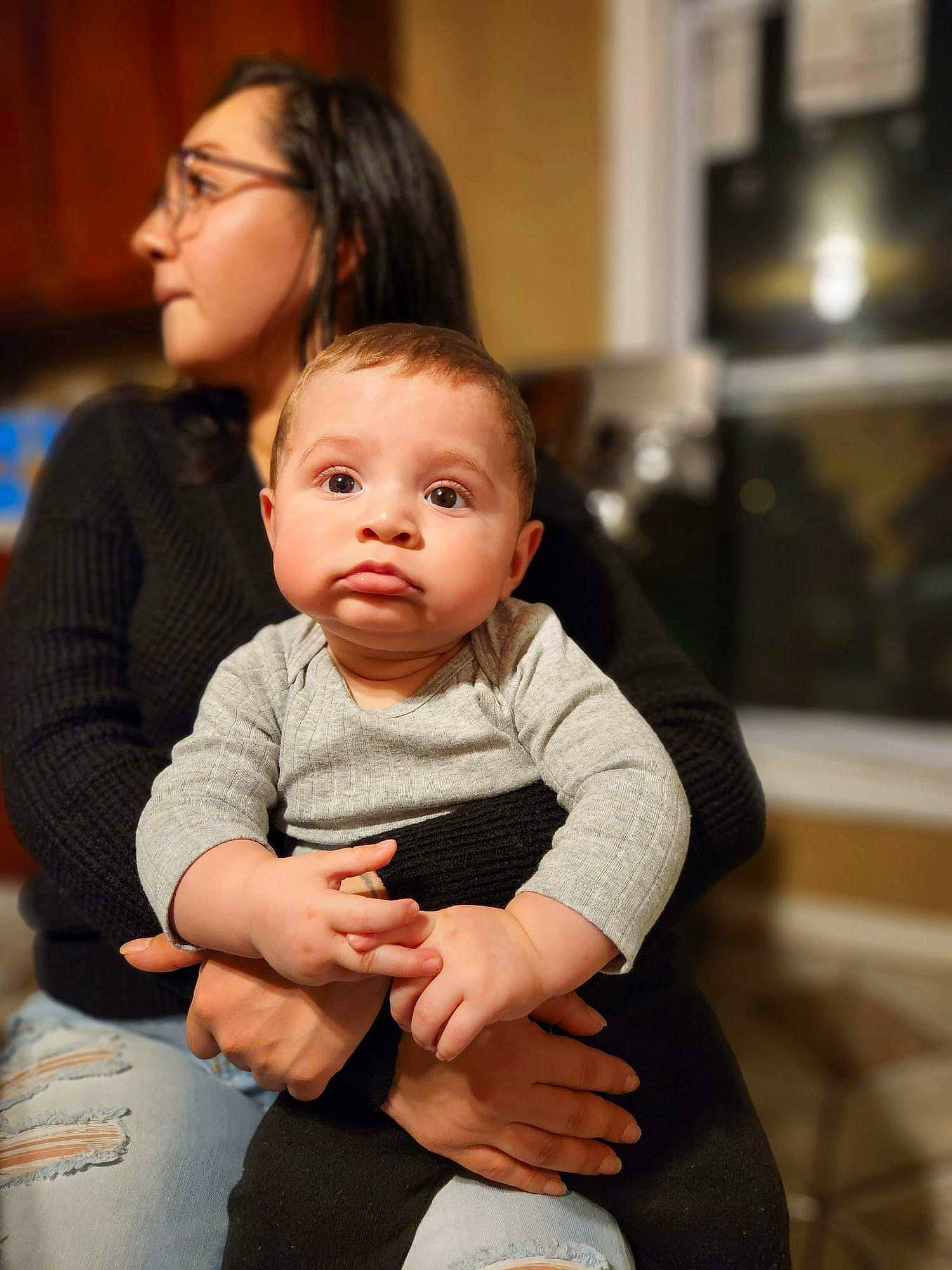 Brian is registered to the contest to win money with this photo: baby, baby_toddler_clothing, cheek, child, comfort, event, eye, face, flash_photography, fun, gesture, happy, person, portrait_photography, sitting, skin, sleeve, smile, toddler