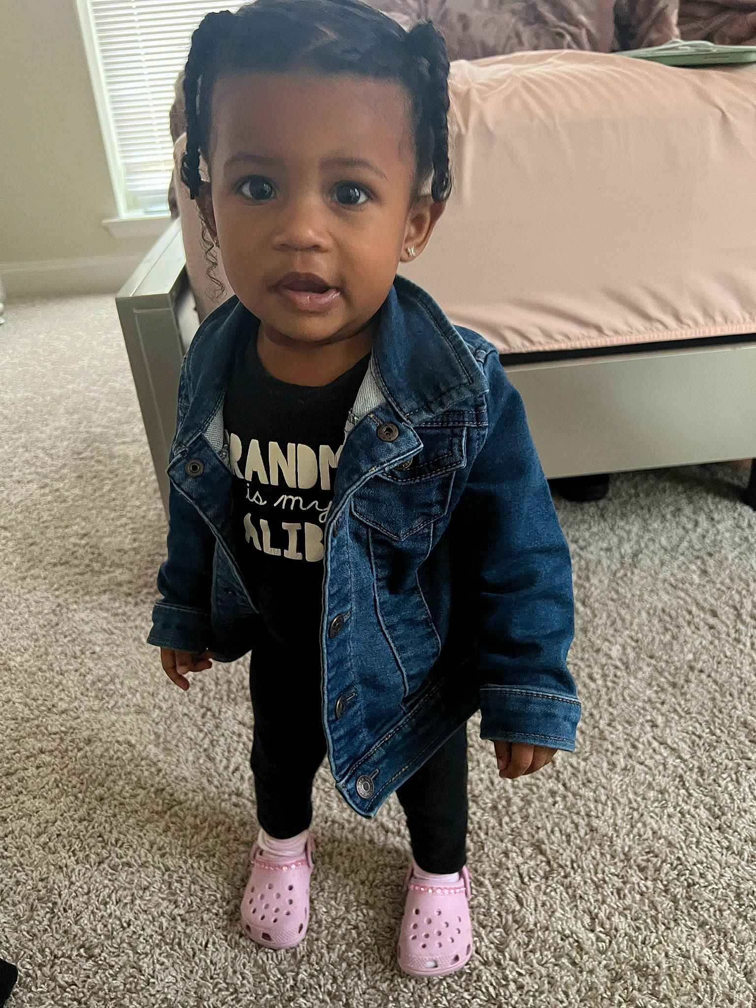 Liana is registered to the contest to win money with this photo: baby, baby_toddler_clothing, cheek, child, comfort, couch, denim, eye, face, flooring, fun, grass, hair, happy, head, person, sitting, skin, sleeve, t_shirt