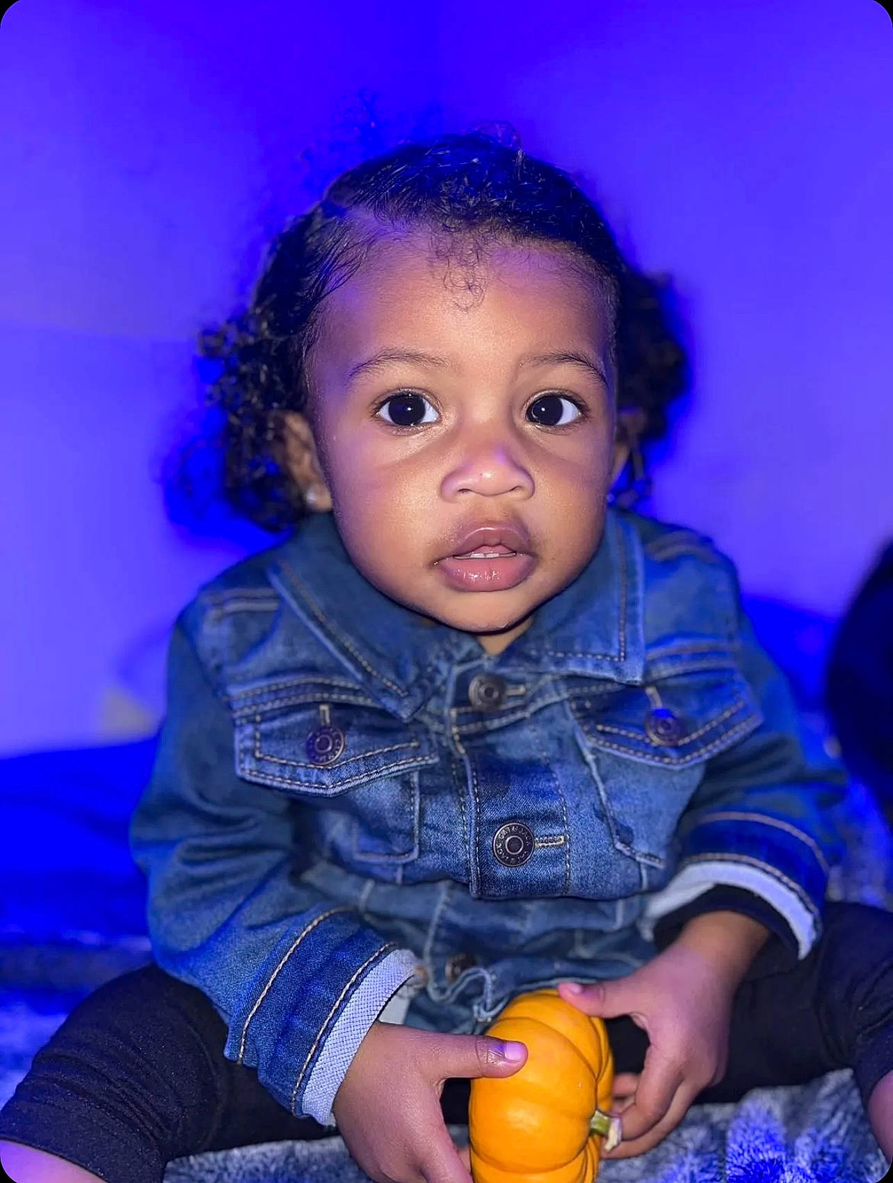 Liana is registered to the contest to win money with this photo: adaptation, baby_toddler_clothing, beauty, black, calabaza, cheek, face, flash_photography, fun, hair, happy, iris, nose, person, photograph, purple, skin, snapshot, standing, toddler