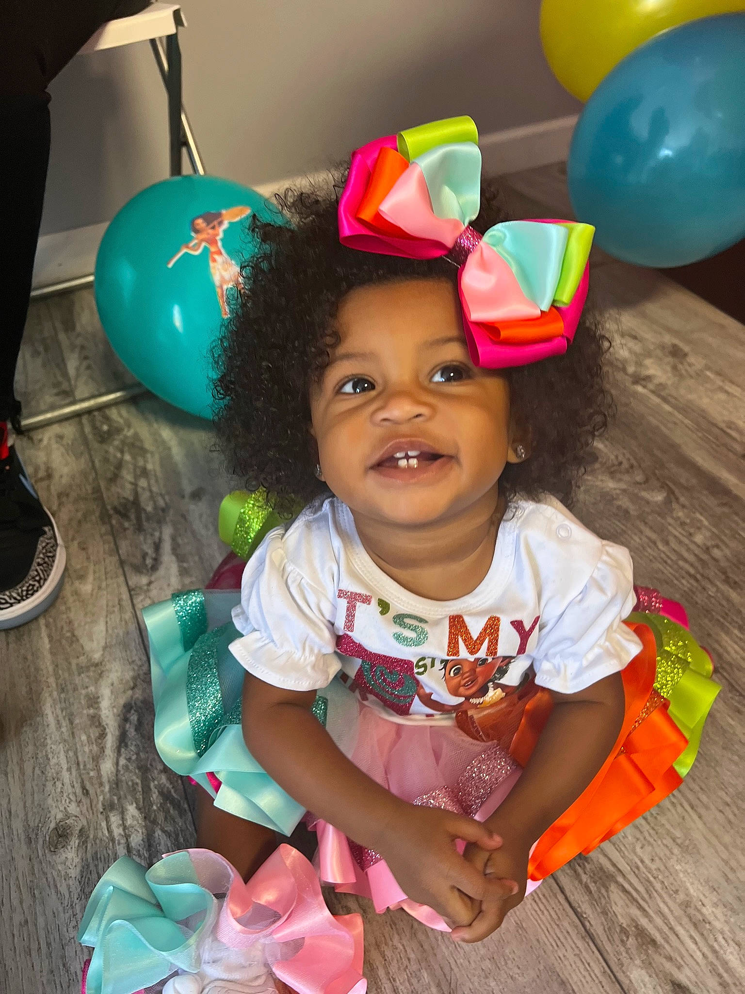 Liana is registered to the contest to win money with this photo: baby, baby_toddler_clothing, balloon, beauty, child, event, fashion_accessory, fun, hairstyle, happy, leisure, magenta, organ, party_supply, person, photograph, pink, play, smile, snapshot