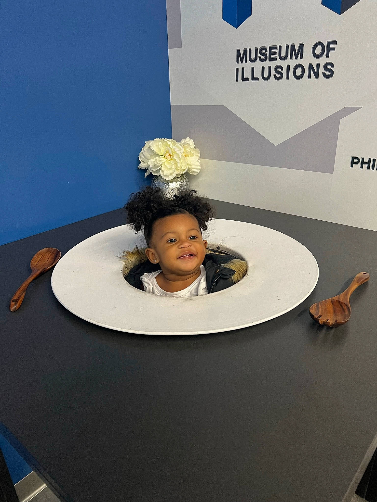 Liana joined the competition — help win amazing prizes! artificial_flower, brand, electric_blue, event, fashion_design, flooring, flower_arranging, font, formal_wear, logo, person, room, speech, table