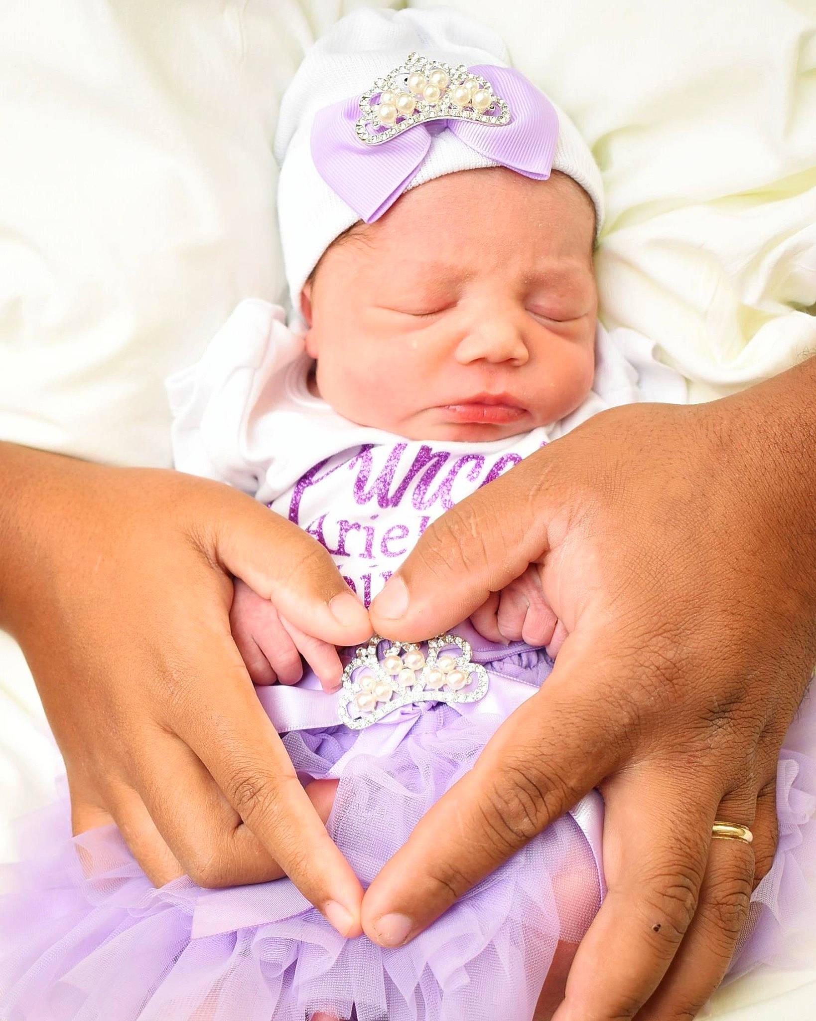 Ariel is registered to the contest to win money with this photo: baby, baby_sleeping, baby_toddler_clothing, cap, cheek, child, comfort, event, eye, finger, gesture, hand, happy, hat, magenta, nail, person, skin, thumb, toddler