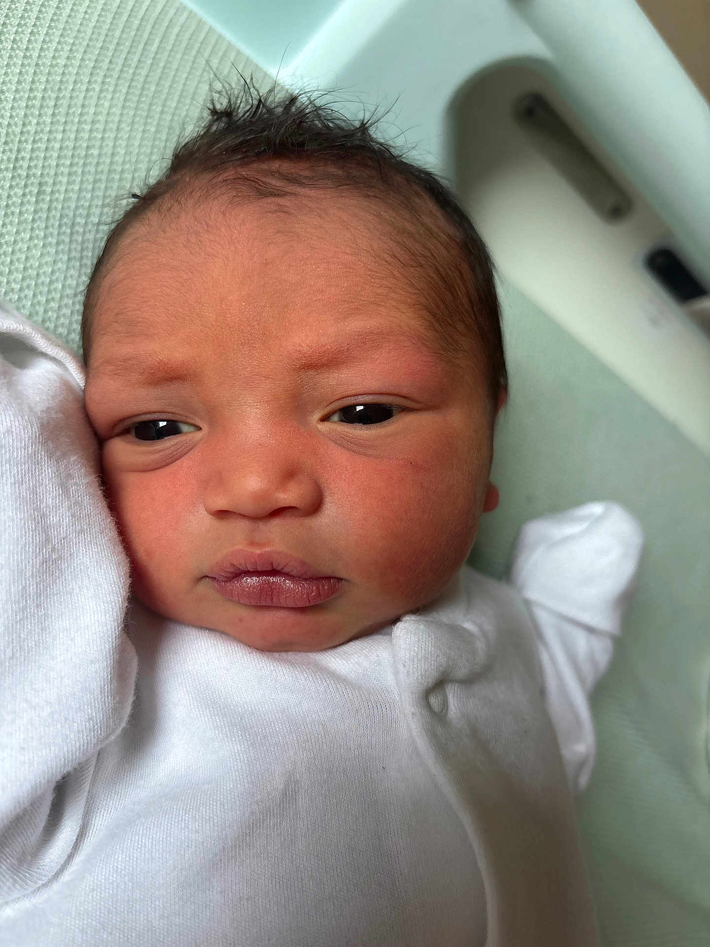 Khamarni joined the competition — help win amazing prizes! newborn, baby, infant, close_up, face, skin, expression, white_clothing, lying_down, texture, curious, indoors, young_child, portrait, head, human, sleepwear, soft, cute, baby_garment